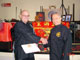 The Shi Gong presenting Co Lau with his 4th Degree certificate